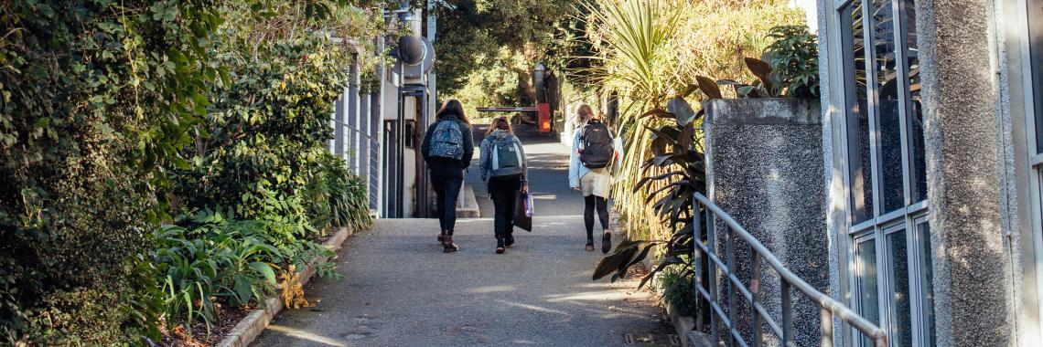 Students walking towards the Falmouth Campus Library