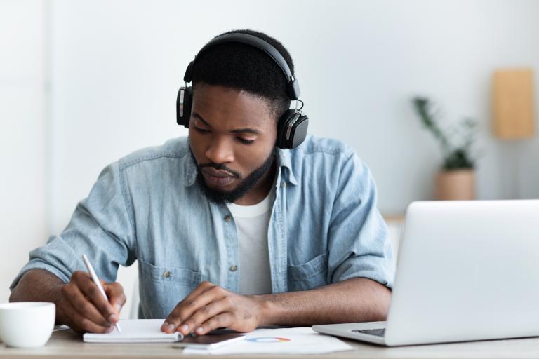 Student working remotely laptop