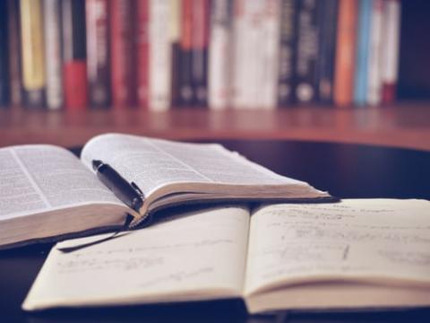 open books and a pen