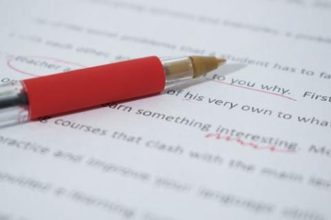 a photo of an essay with corrections